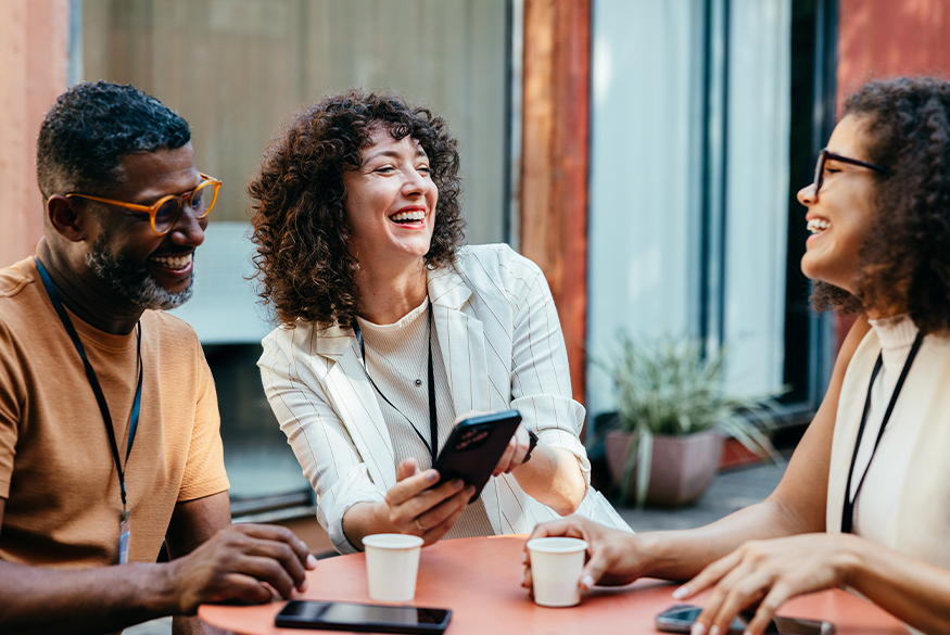 Coworkers talking during a coffee break